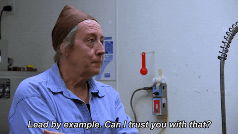 A man asking a woman, "Lead by example. Can I trust you with that?"