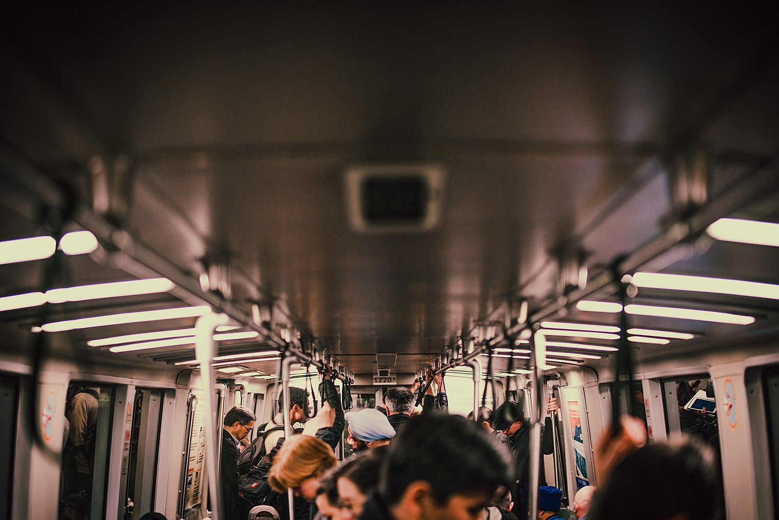 Commuters on a subway in San Francisco